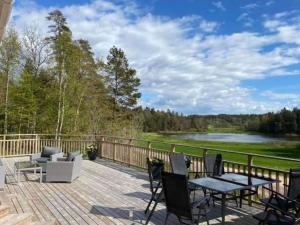 Fresh cottage with lake view and rowing boat SE09156