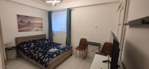 Apártmany v centre - vlastná izba so spoločnou kuchyňou a kúpeľnou môže byť zdieľaná 2 inými izbami