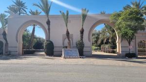 Chic Palm Grove Apartment Pool View