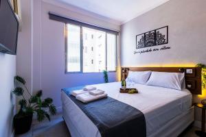 Moderno no Gonzaga a 400m da praia com AC