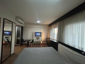 Hotel Mercu Paraiso Beneficência com garagem e cozinha 1209