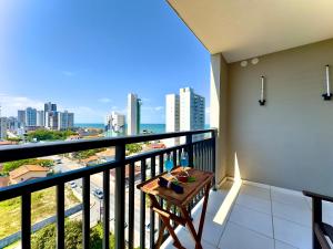 Apto Bal Picarras 150M PRAIA com PISICNA, Cozinha completa, sacada com CHURRASQUEIRA privativa, Wi Fi, PORTARIA 24h,vaga privativa de GARAGEM