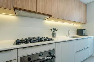 Apto c Churrasqueira a 85 m da Praia DOI0203