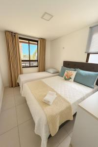 Mandara Lanai - Apto 101, bloco 12 - 2quartos, 3 wcs - Porto Dunas, pé na areia