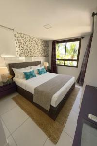 Mandara Lanai - Apto 101, bloco 12 - 2quartos, 3 wcs - Porto Dunas, pé na areia