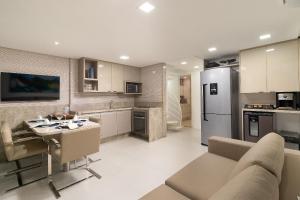 Bangalô pé na areia em Resort Muro Alto