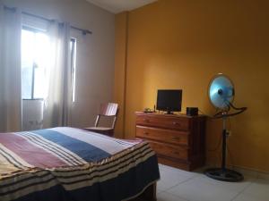 habitación cómoda con baño en suite y servicio de taxi