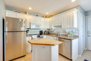 Steps to Boardwalk Carolina Beach Condo with Views!