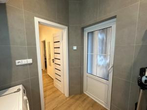 Modern City Apartment with Balcony by Rentez