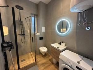 Modern City Apartment with Balcony by Rentez