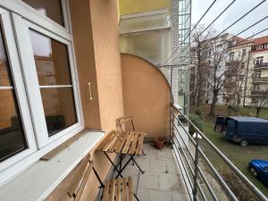 Modern City Apartment with Balcony by Rentez