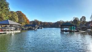 Lakefront Home Private Dock Tiki Bar Firepit Shore to Please by AvantStay