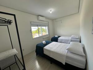 Apartamento completo com AR Condicionado em Viamao