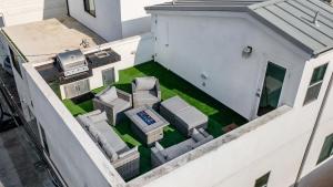 Private Rooftop Steps to the Beach Chic Design Seaside Style by AvantStay