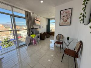 Moderno y Céntrico Loft con Vista a la Ciudad