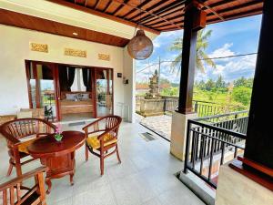 Puri Anyar Guesthouse - Panoramic rice field views 3Km to Central Ubud