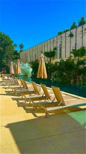 Spacious Townhouse with Pool and slide, Gym, BBQ, Kids playground