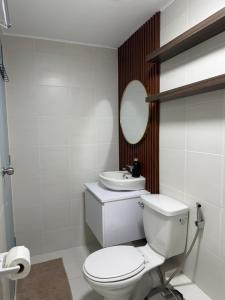 The UrbanNest - 1BR Condo in Marina Spatial, Dumaguete with free fast WiFi and Pool