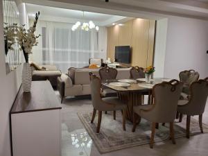 The comfort executive loft two bedroom apartment with amazing breathtaking city views , swimming pool ,gym ,private ample parking space with designated child playground area