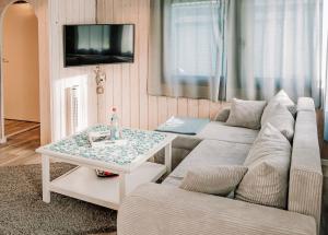 Ferienhäuser Insel Usedom Waldhaus 1 mit Whirlpool - Direkt am Achterwasser