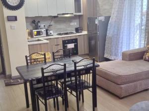 Affordable living two bedroom apartment with fully equipped gym ample parking space heated swimming pool children playing ground and amazing scenic views