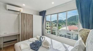 Dcondo Kathu - Top Floor 1 Bdr Condo with shared Pool