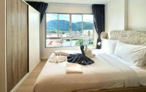 Dcondo Kathu - Top Floor 1 Bdr Condo with shared Pool