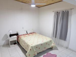 Acogedora casa con galeria y jardin