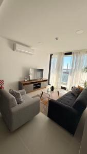 Vivo Costanera frente a la playa San José de Encarnación! Apartamento de 2 Habitaciones