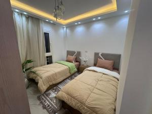 Modern Furnished 2BR Home First Use in Madinaty