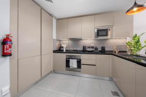 Easy access to Community Parks and Green Spaces,15 minutes drive to Miracle Garden - Rigel, JVC, by Deluxe Holiday Homes