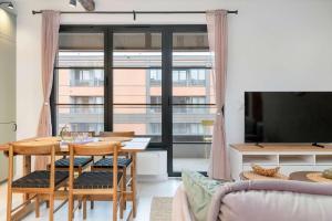 Stylish Pastel Apartment with Parking and Balcony by Noclegi Renters