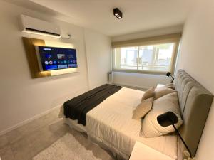 Departamento moderno pleno centro con pileta y cochera privada