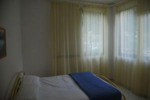 Bright flat in Rosolina with shared pool