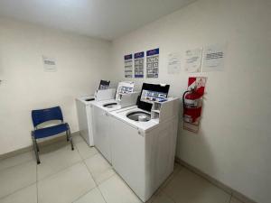 Studio featuring a private terrace with a grill