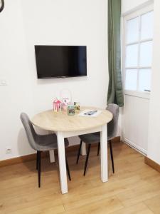 Plein centre Cosy 38m2 avec accès terrasse, spa et sauna communs Place Dalton