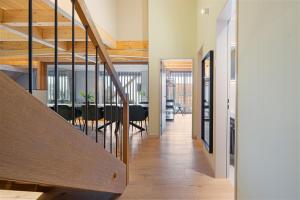 Visionary Hospitality Bassersdorf, Zürich - Premium Apartments in Swiss Style with Free Parking, Washer, Kitchen, Terrace, Vaulted Cellar Event Room, Bus Stop, 15 City & Airport