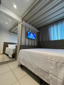 Flat Beach Class Excelsior - Apto Completo para 4 pessoas vista rio e mar