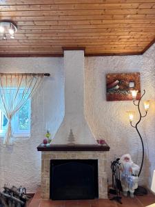 Δωμάτια Εξοχή-With fireplace and view to the sea