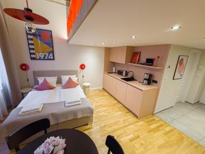 Heritage Haven Mezzanine Apartment with Balcony