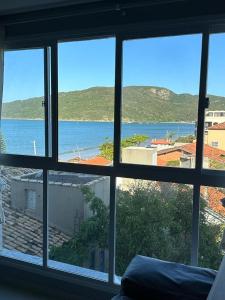 Apartamento aconchegante pé na areia 2 quartos