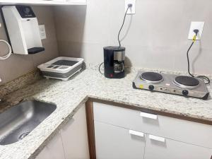 Studio Negócios e praia Concept 212