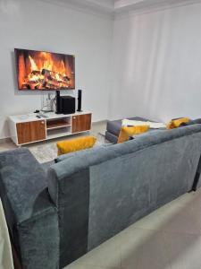 CM Snug stay -Naivegas Apartments