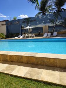 APARTAMENTO COM PISCINA 500mt DA PRAIA e 10 MINUTOS DE CUMBUCO