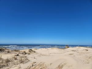 Casa pé na areia com Piscina