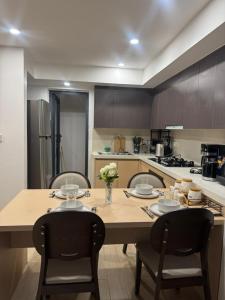 Pristine 2BR with City Skyline Views Walk to NextgenMall at Southpark Apartments