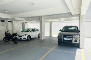 Apartmento à 2 minutos da Praia do Forte e Ilha do Japonês