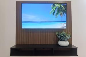 Varanda ensolarada a alguns passos do mar