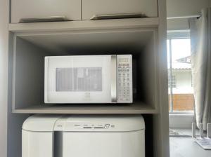 Aconchegante! Studio na Fazenda da Armação! DE02J