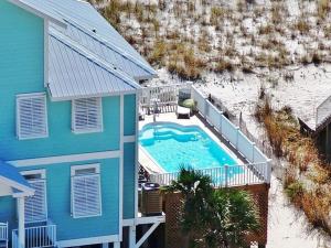 Miltys Martini by GSVR - Luxurious Beachfront Retreat with NEW Porches & Pool - FREE Activities and Golf